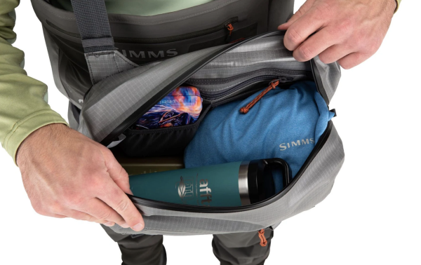 Waterproof Simms Dry Creek Z Sling Pack, perfect for keeping gear dry on fishing adventures.
